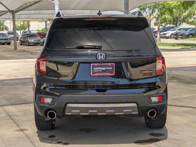 Photo of 2023 Crystal Black Pear Honda Passport