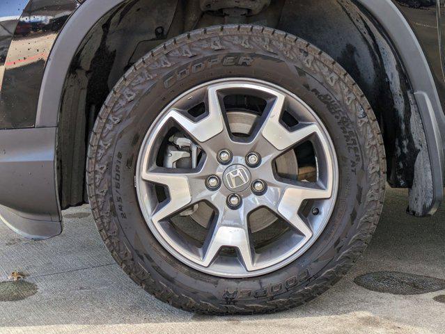 Photo of 2023 Crystal Black Pear Honda Passport