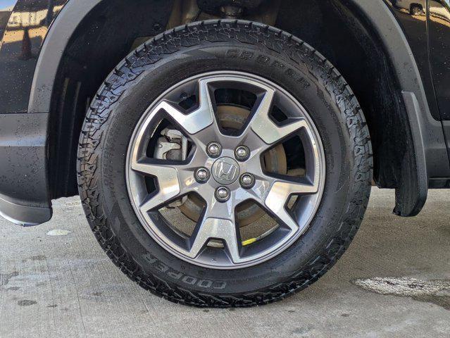 Photo of 2023 Crystal Black Pear Honda Passport