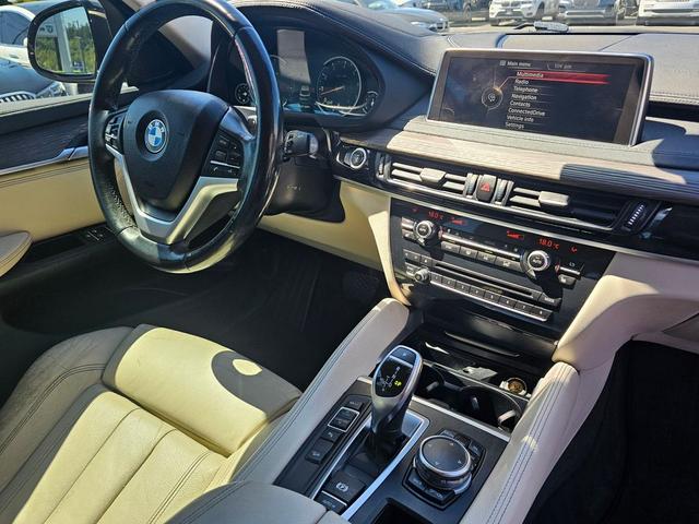 Photo of 2016 Dark Olive Metallic BMW X6