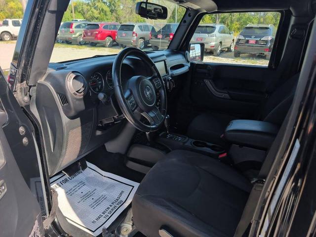 Photo of 2015 Black Clearcoat Jeep Wrangler Unlimited