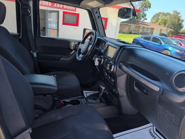Photo of 2015 Black Clearcoat Jeep Wrangler Unlimited