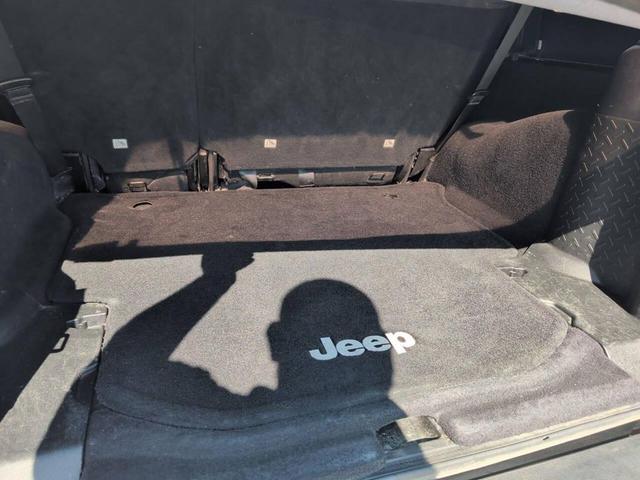 Photo of 2015 Black Clearcoat Jeep Wrangler Unlimited