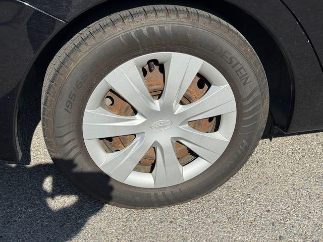 Photo of 2016 Crystal Black Silica Subaru Impreza