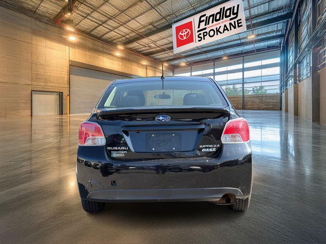 Photo of 2016 Crystal Black Silica Subaru Impreza