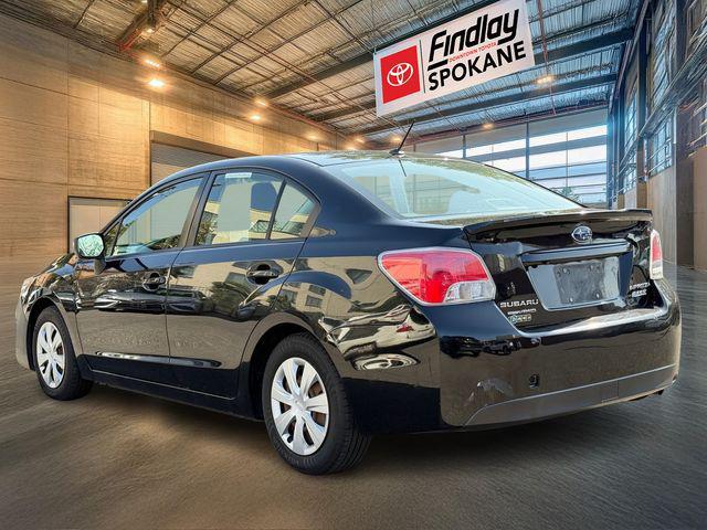 Photo of 2016 Crystal Black Silica Subaru Impreza