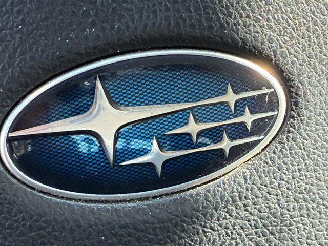 Photo of 2016 Crystal Black Silica Subaru Impreza