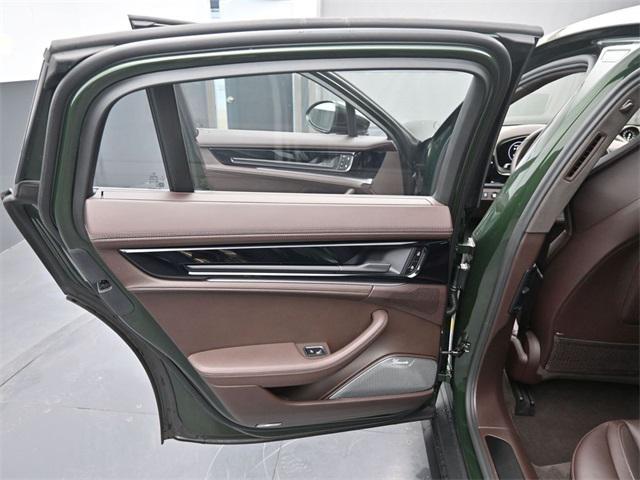 Photo of 2025 Oak Green Metallic Neo Porsche Panamera