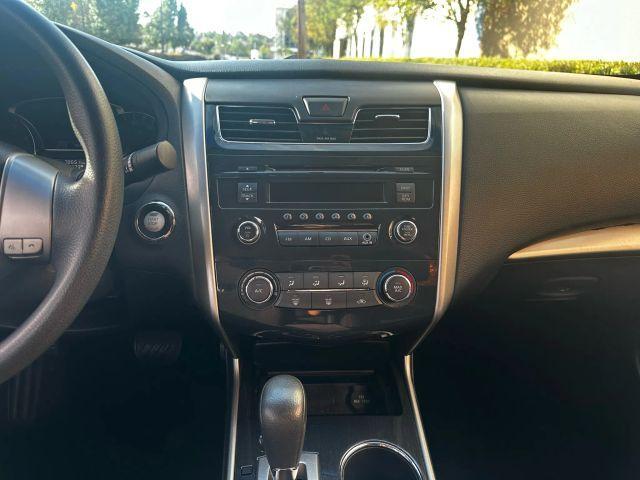 Photo of 2014 Gun Metallic Nissan Altima