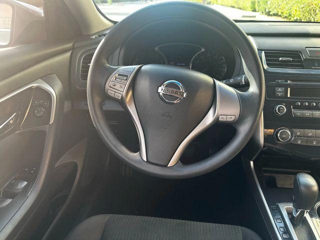 Photo of 2014 Gun Metallic Nissan Altima