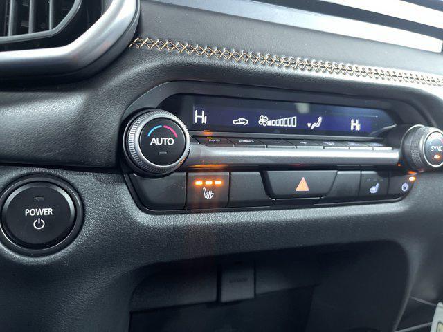Photo of 2025 Jet Black Mica Mazda CX-50 Hybrid