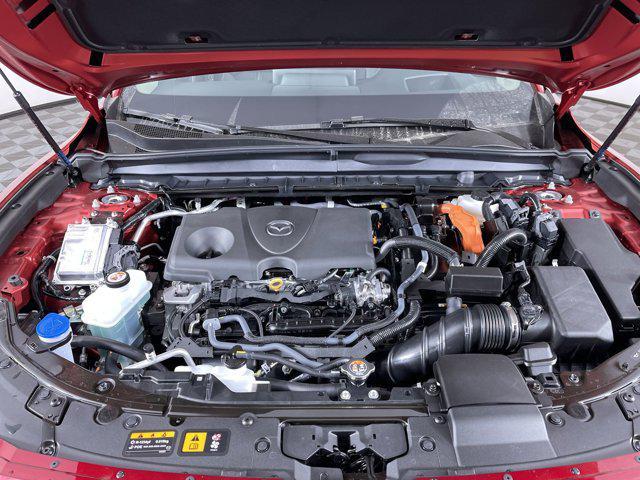 Photo of 2025 Soul Red Crystal Metallic Mazda CX-50 Hybrid