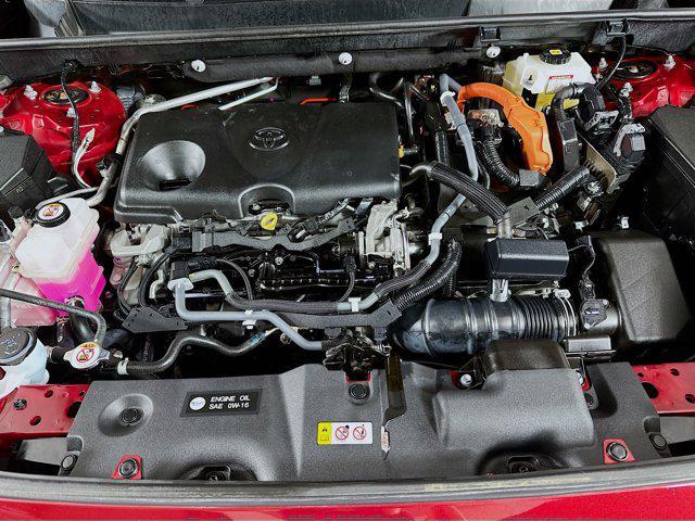Photo of 2021 Ruby Flare Pearl Toyota RAV4 Hybrid