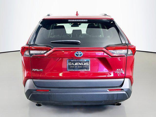 Photo of 2021 Ruby Flare Pearl Toyota RAV4 Hybrid