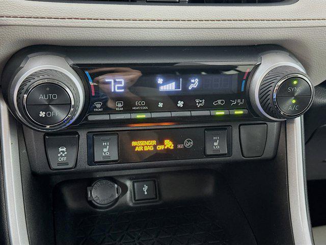 Photo of 2021 Ruby Flare Pearl Toyota RAV4 Hybrid