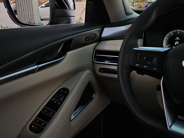 Photo of 2025 Deep Bordeaux INFINITI QX60