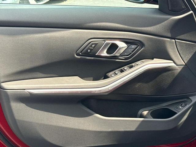 Photo of 2025 Vegas Red Metallic BMW 330