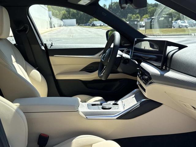 Photo of 2025 Cape York Green Metallic BMW i4 Gran Coupe