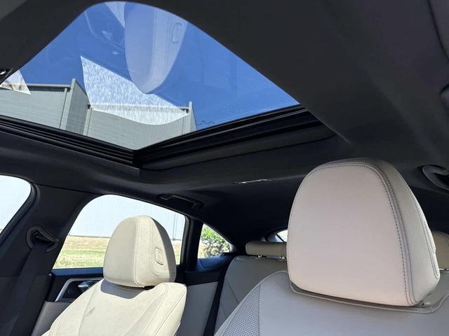 Photo of 2025 Cape York Green Metallic BMW i4 Gran Coupe