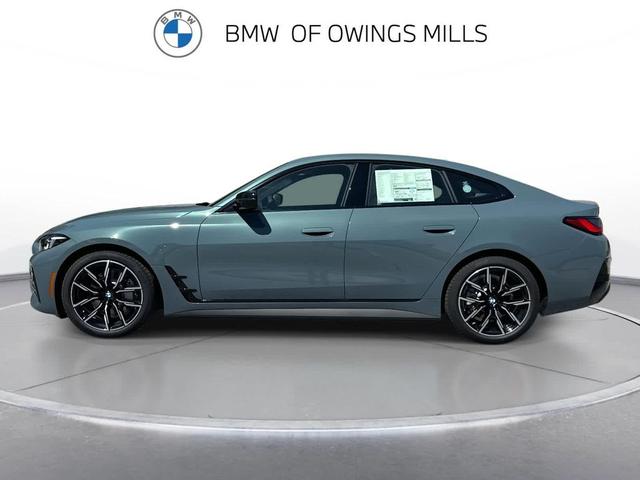 Photo of 2025 Cape York Green Metallic BMW i4 Gran Coupe