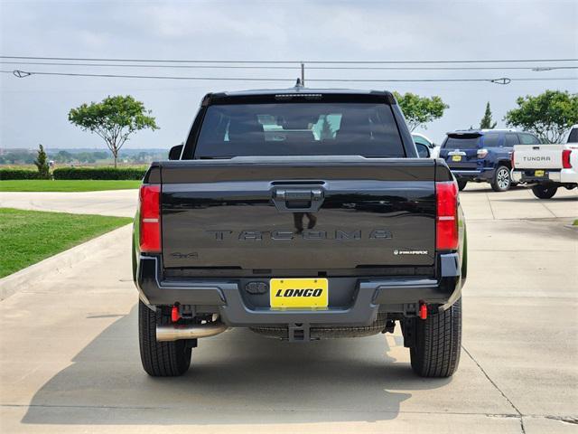 Photo of 2025 Black Toyota Tacoma