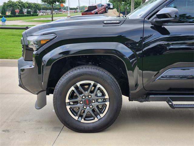 Photo of 2025 Black Toyota Tacoma