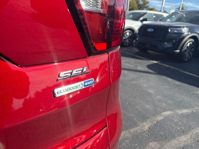 Photo of 2019 Ruby Red Metallic Tinted Clearcoat Ford Escape