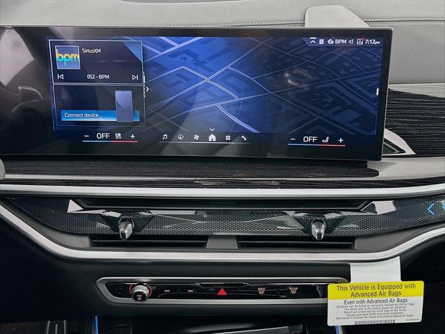 Photo of 2026 Skyscraper Grey Metallic BMW X5 PHEV