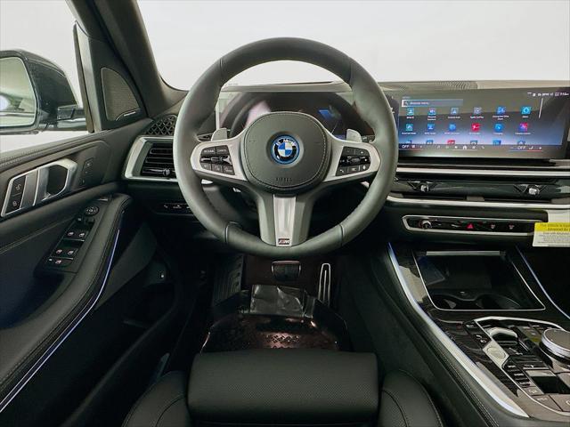 Photo of 2026 Skyscraper Grey Metallic BMW X5 PHEV