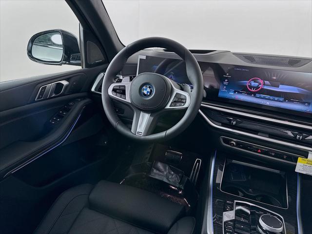 Photo of 2026 Skyscraper Grey Metallic BMW X5 PHEV
