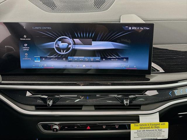 Photo of 2026 Skyscraper Grey Metallic BMW X5 PHEV