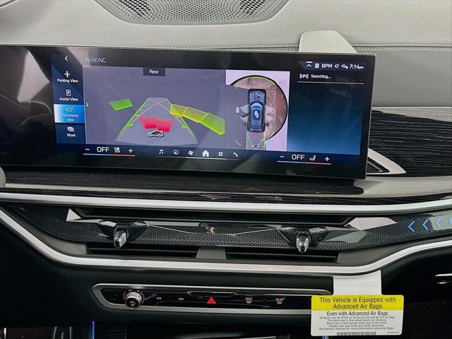 Photo of 2026 Skyscraper Grey Metallic BMW X5 PHEV