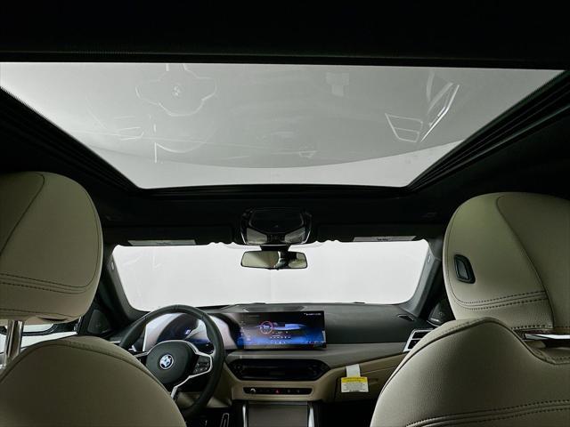 Photo of 2025 Cape York Green Metallic BMW i4 Gran Coupe