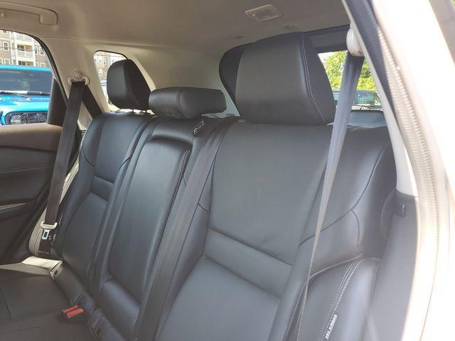 Photo of 2022 Champagne Silver Nissan Rogue