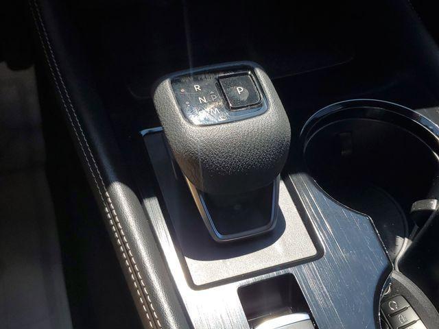 Photo of 2022 Champagne Silver Nissan Rogue