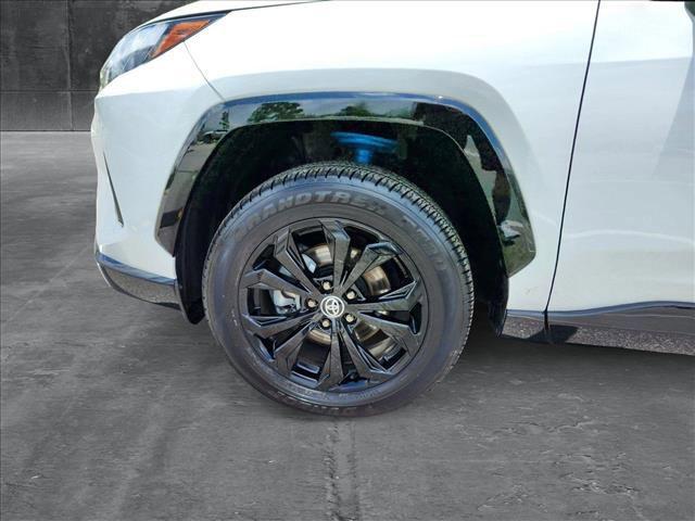 Photo of 2024 Wind Chill Pearl Toyota RAV4 Hybrid