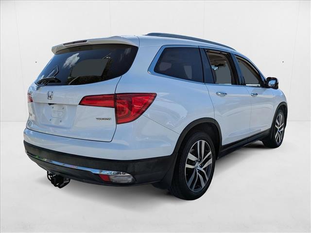Photo of 2016 White Diamond Pearl Honda Pilot