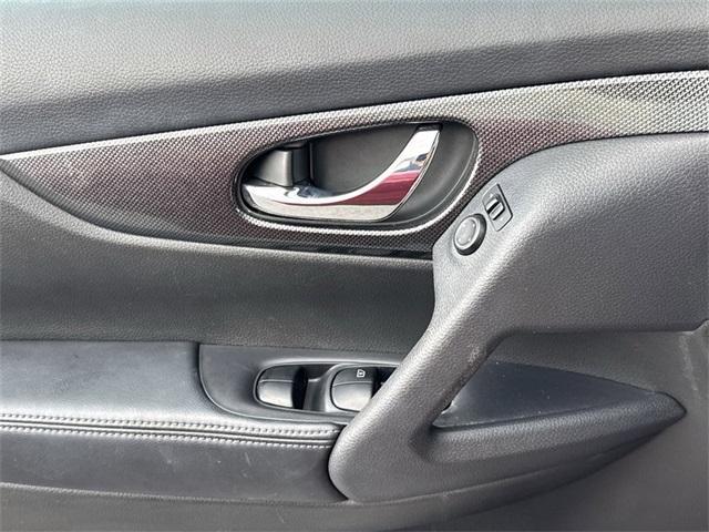 Photo of 2015 Cayenne Red Nissan Rogue