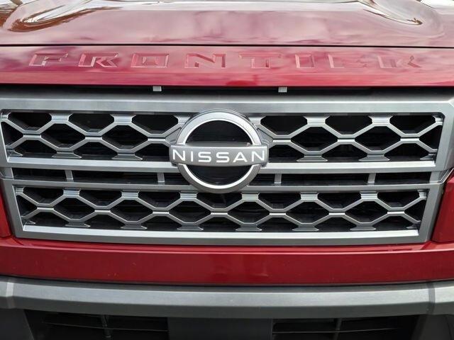 Photo of 2024 Cardinal Red Metallic Nissan Frontier