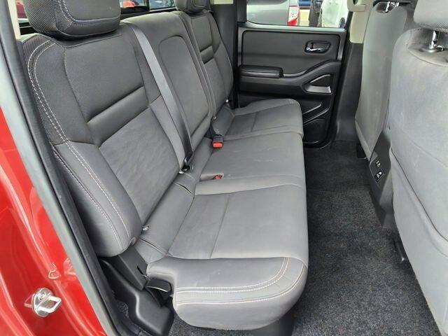Photo of 2024 Cardinal Red Metallic Nissan Frontier