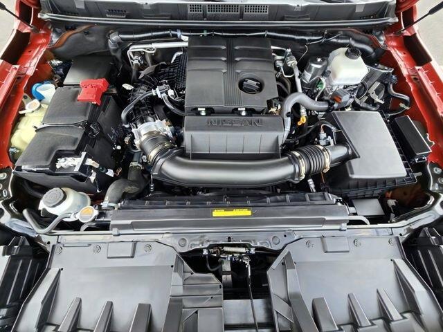 Photo of 2024 Cardinal Red Metallic Nissan Frontier
