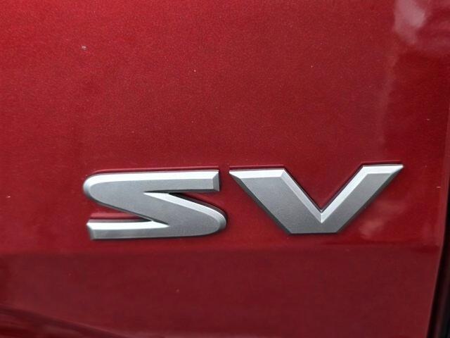 Photo of 2024 Cardinal Red Metallic Nissan Frontier