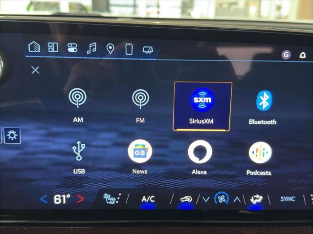 Photo of 2025 Radiant Red Tintcoat Chevrolet Traverse