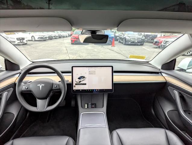 Photo of 2021 Pearl White Multi-Coat Tesla Model 3