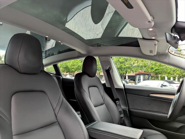 Photo of 2021 Pearl White Multi-Coat Tesla Model 3