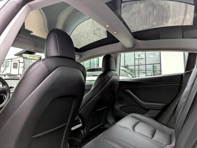Photo of 2021 Pearl White Multi-Coat Tesla Model 3