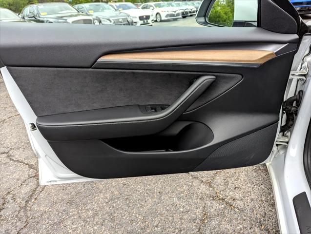 Photo of 2021 Pearl White Multi-Coat Tesla Model 3