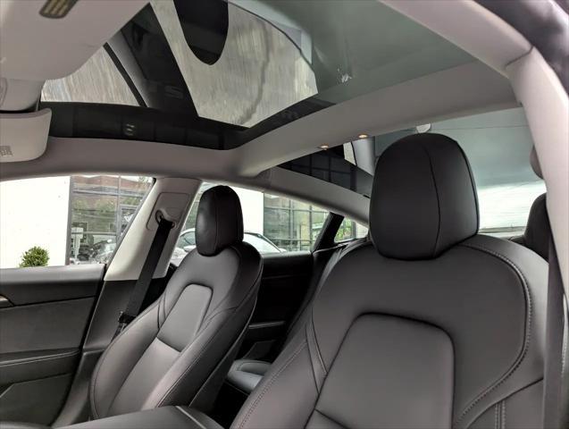 Photo of 2021 Pearl White Multi-Coat Tesla Model 3