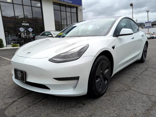 Photo of 2021 Pearl White Multi-Coat Tesla Model 3