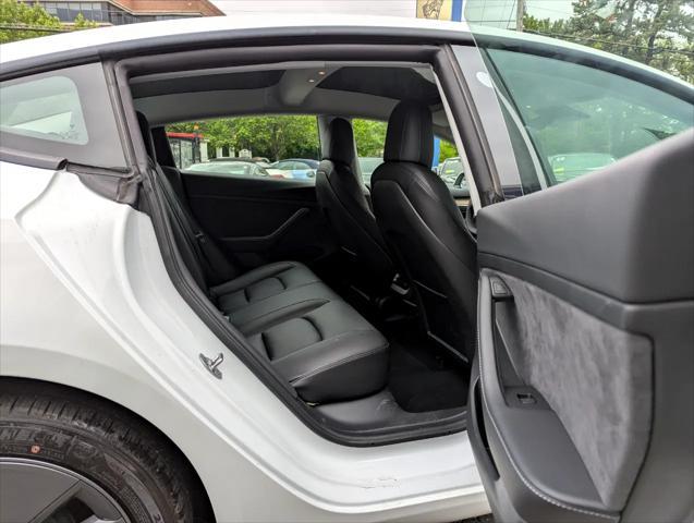 Photo of 2021 Pearl White Multi-Coat Tesla Model 3